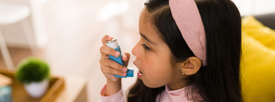 Girl using an inhaler